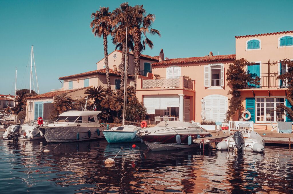 A breathtaking view of Monaco’s coastline, featuring luxury yachts, elegant architecture, and the stunning blue waters of the Mediterranean.