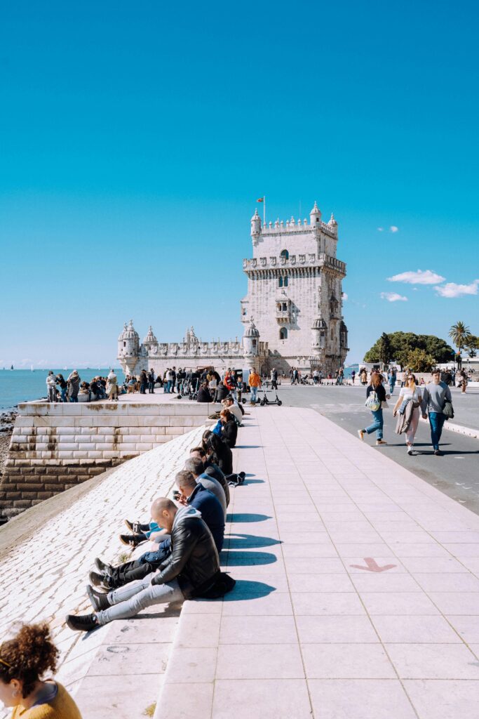 Belém Tower (Torre de Belém) in Lisbon, Portugal, a stunning 16th-century fortress on the banks of the Tagus River, showcasing intricate Manueline architecture with ornate carvings, watchtowers, and panoramic views.